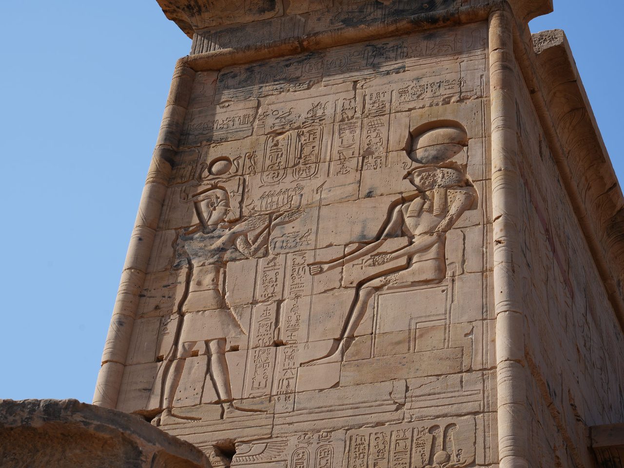 The stunningly preserved reliefs of Isis and Pharaoh at Philae Temple
