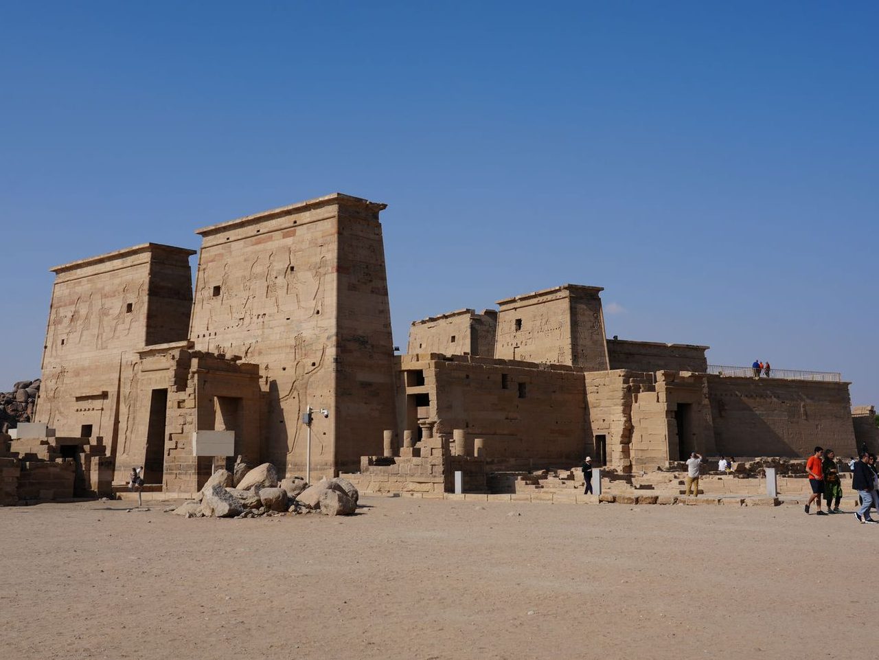 The magnificent ancient complex of Philae Temple standing proud under the blue sky