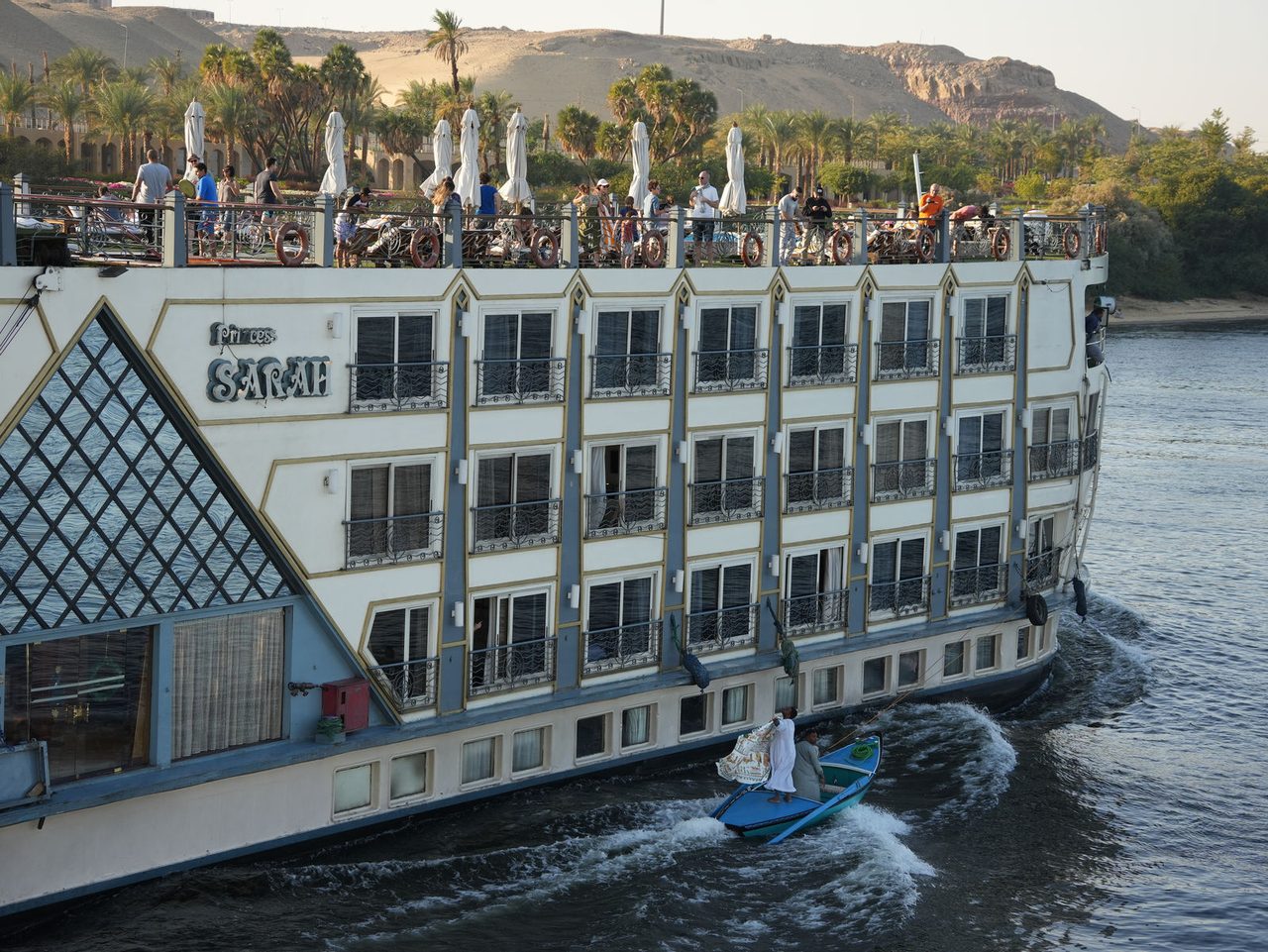 Vibrant river merchants trading with guests aboard the Princess Sarah cruise ship
