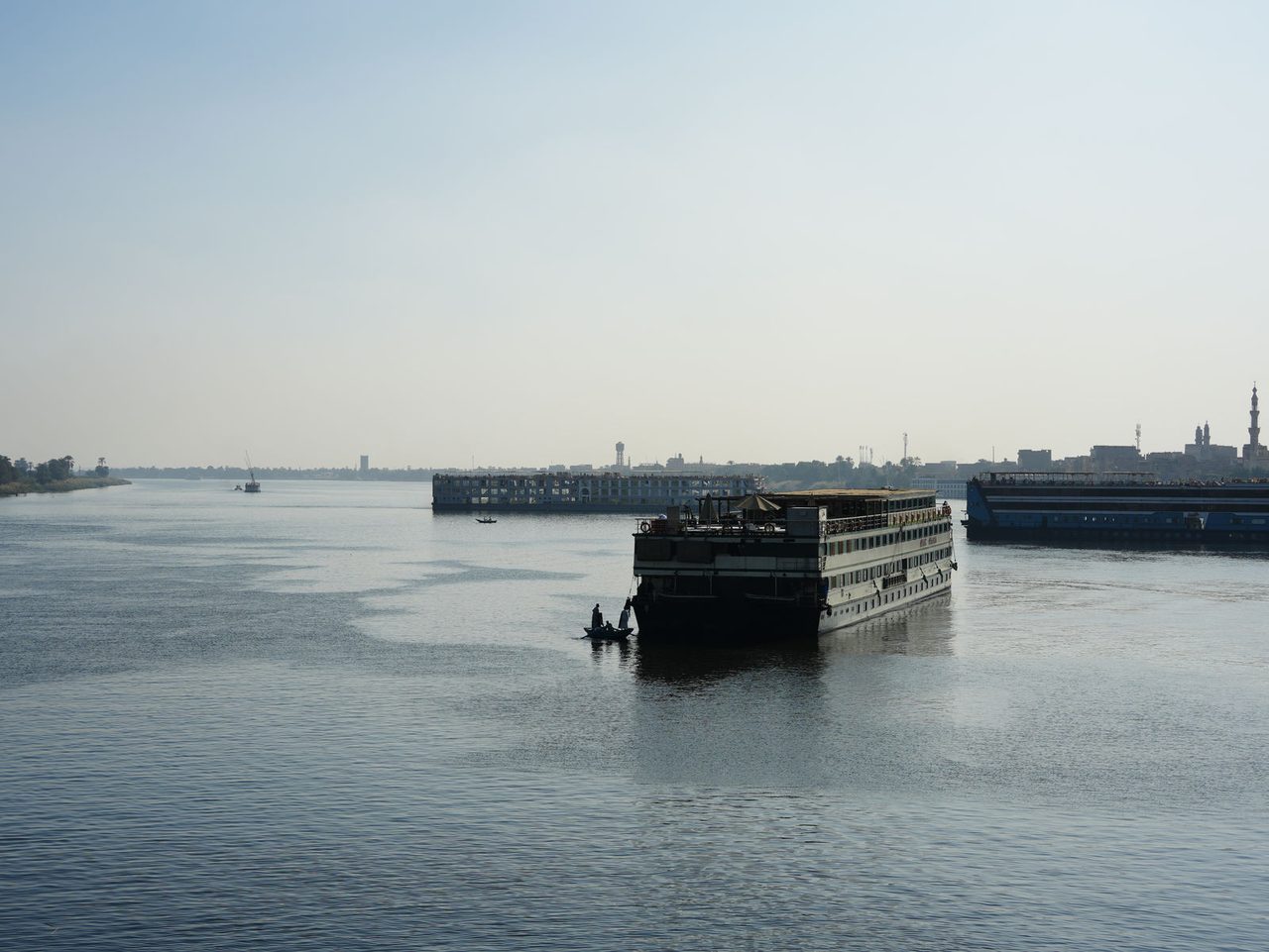 Majestic cruise ships sailing along the endless waters of the Nile River
