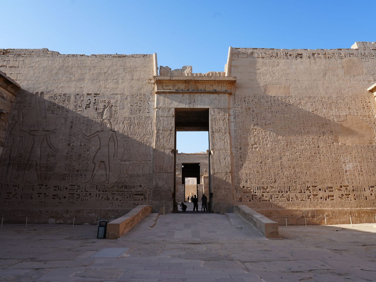 The second pylon and inner courtyard with detailed hieroglyphic reliefs at Medinet Habu