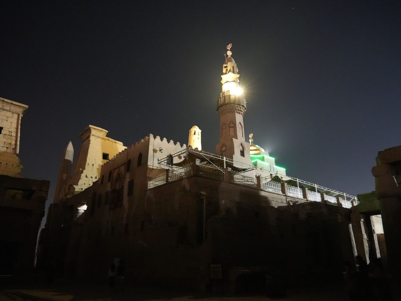 The illuminated Mosque of Abu al-Haggag built within the ruins of Luxor Temple at night