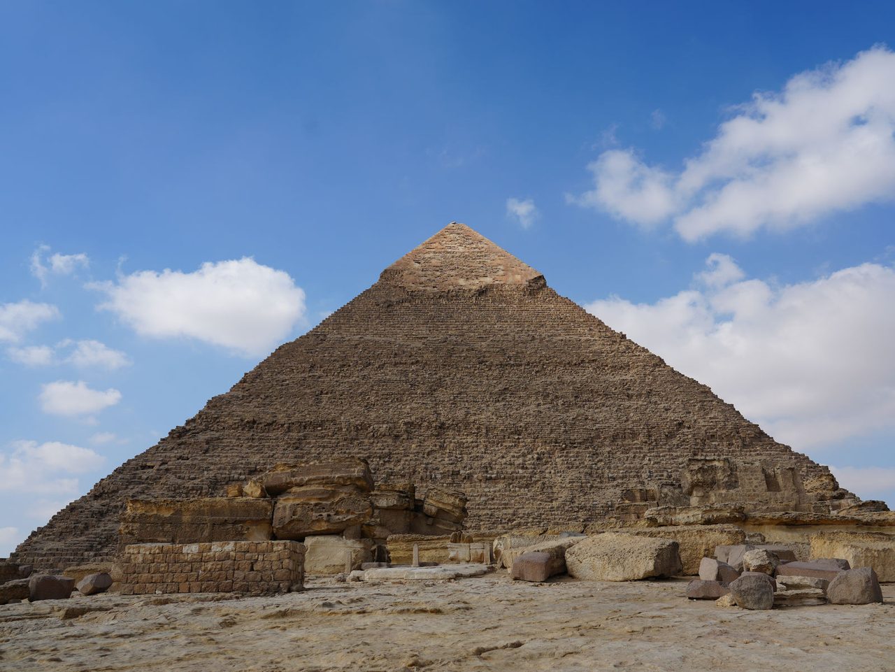 The magnificent Pyramid of Khafre rising above the ancient temple ruins