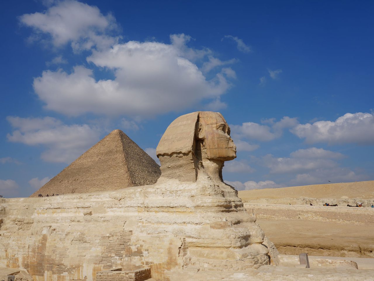 The Great Sphinx of Giza standing proud against a brilliant blue sky