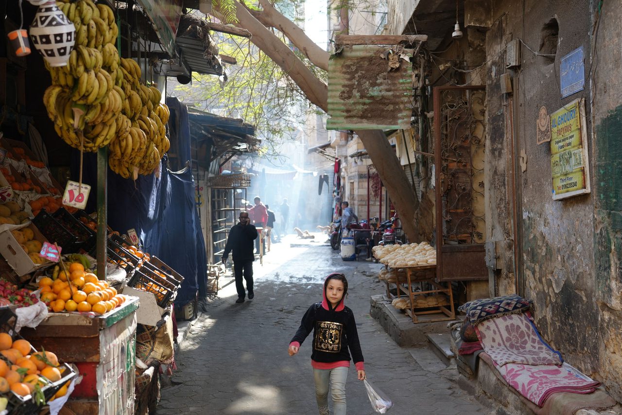 Vibrant fruit stalls and daily life in the alleys of Al-Ghourieya