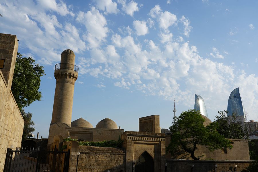 Palace of the Shirvanshahs with a view of Flame Towers