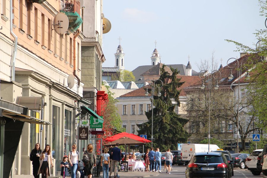 The twin spires of the Church of St Philip and St James rising above Vokiečių Street