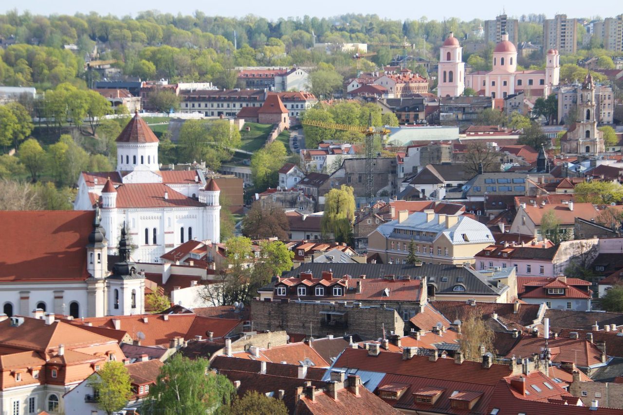 The Cathedral of the Theotokos rising above classical red roofs