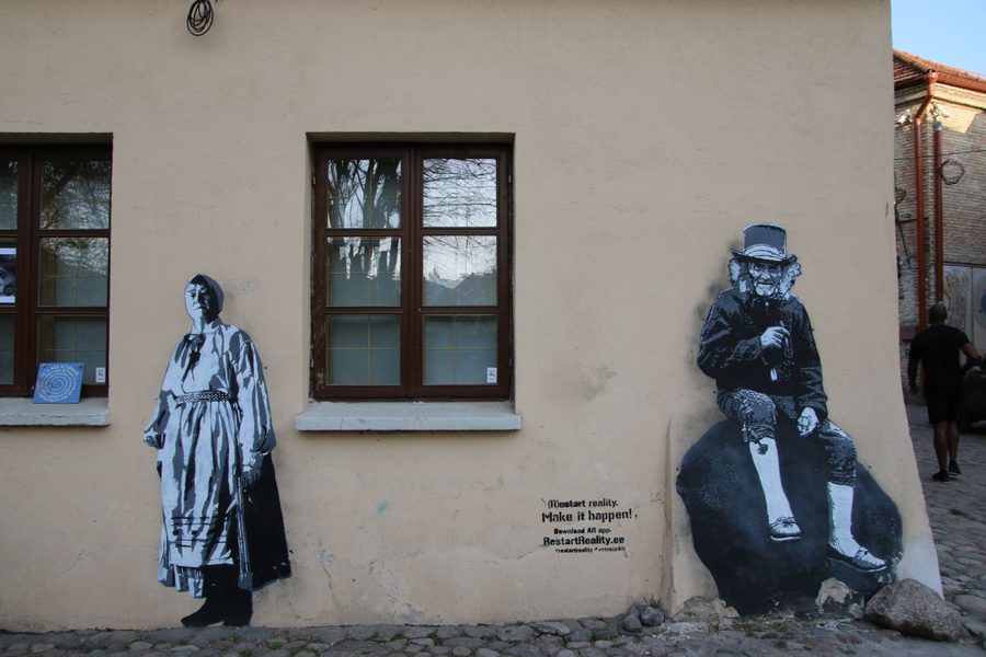 "Restart Reality" street art by Edward von Lõngus on a building wall