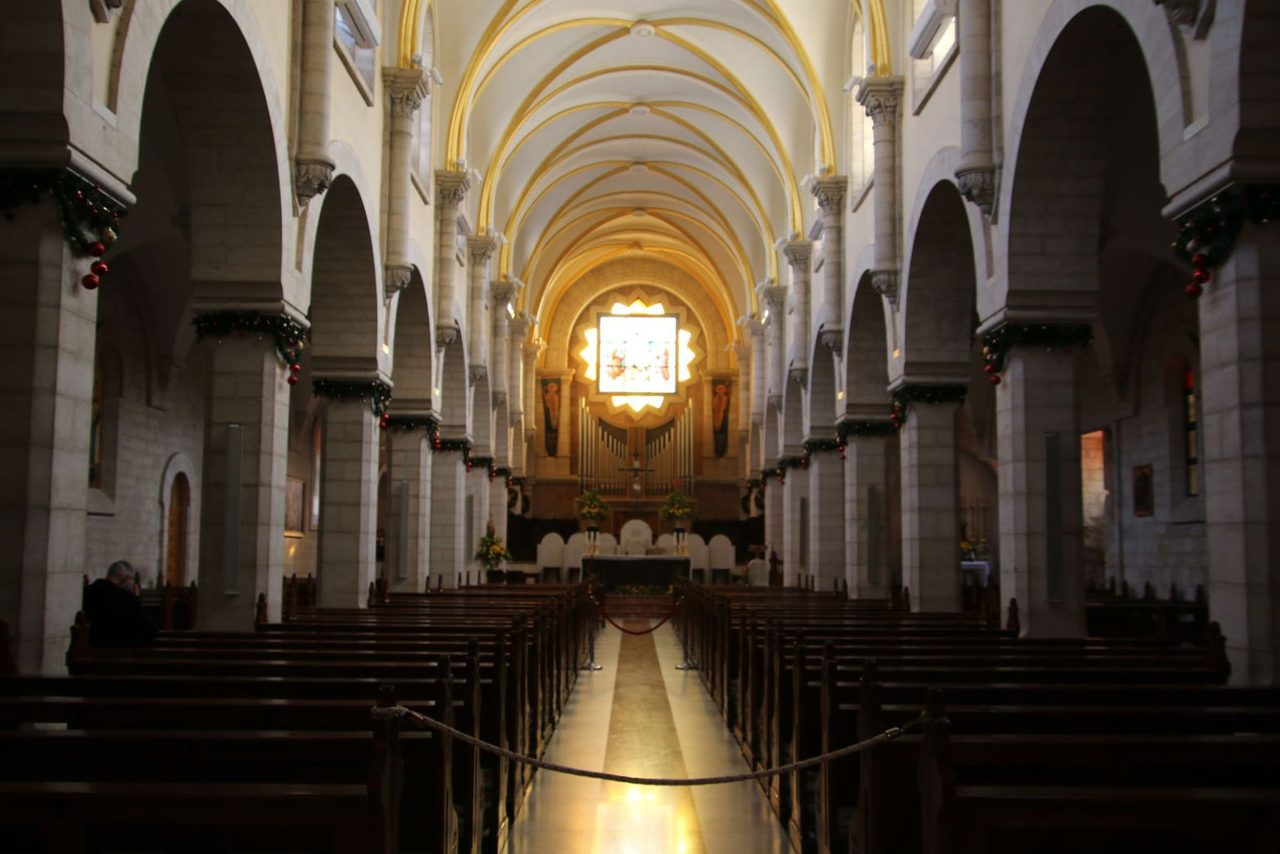 The grand nave and beautiful arches inside the Church of St. Catherine