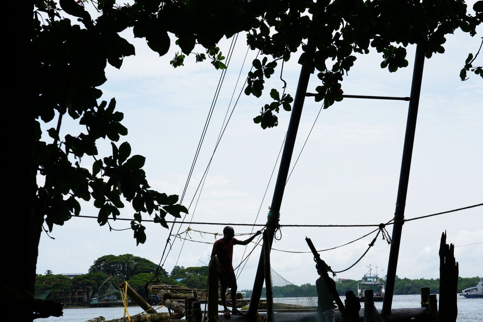 Fishermen operating Chinese Fishing Nets