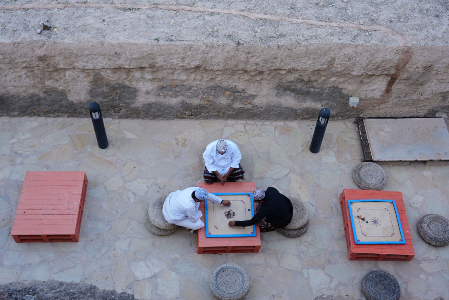 Local Men Playing Carrom