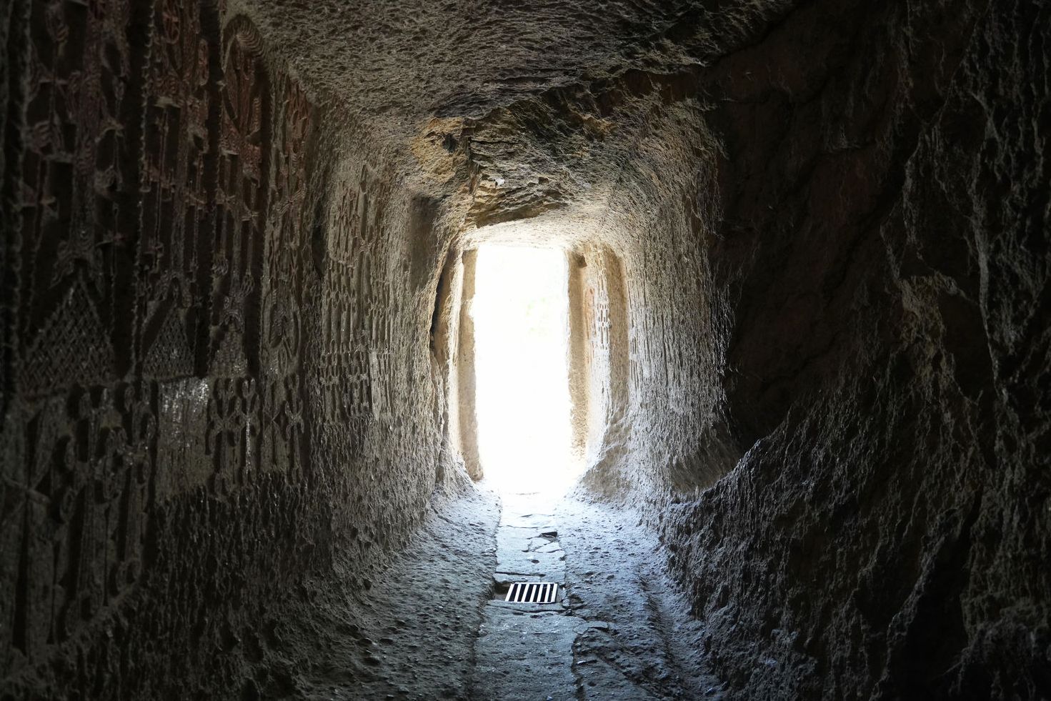 Inside the rock-cut passage at Geghard Monastery