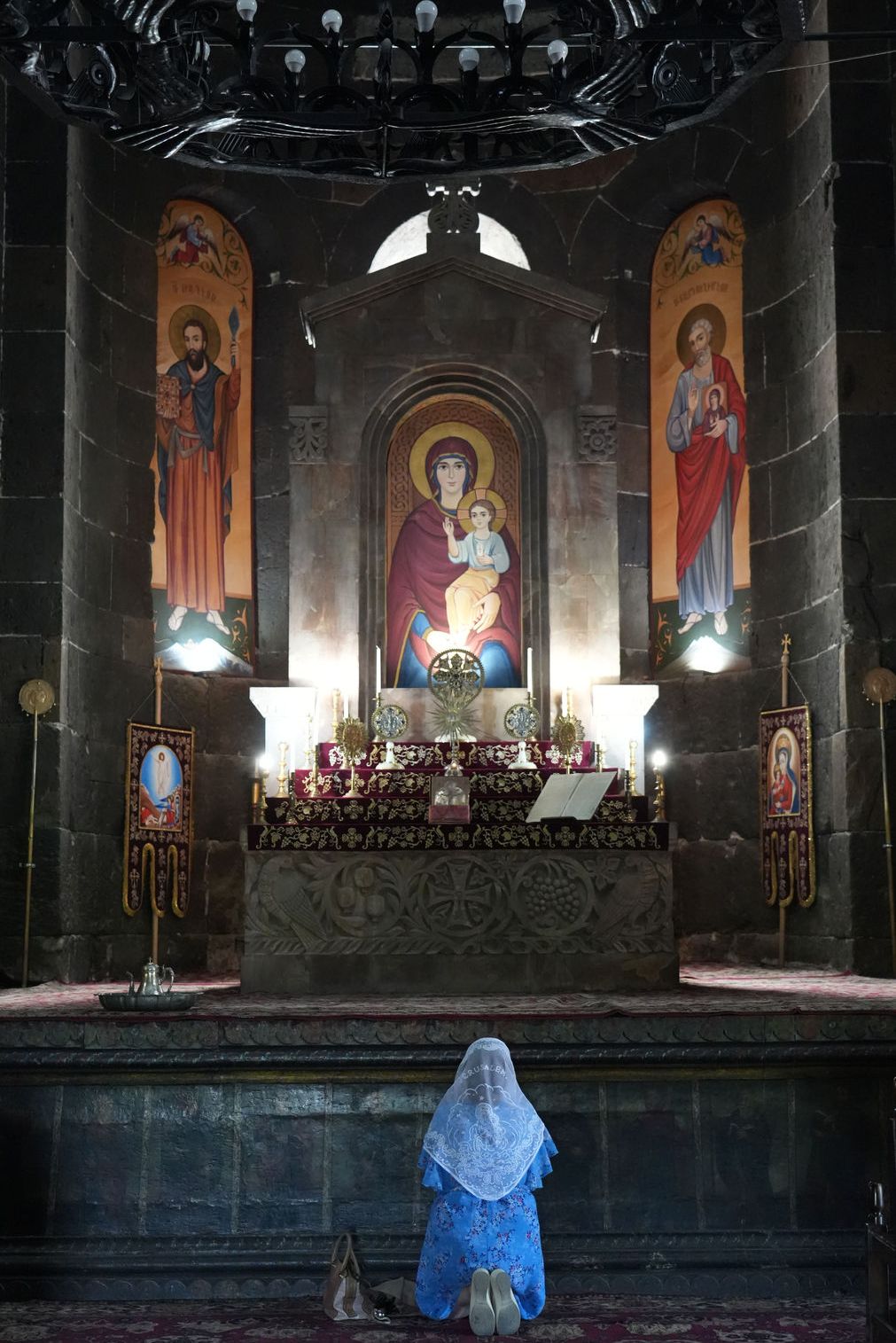 A moment of deep prayer at Saint Hripsime Church