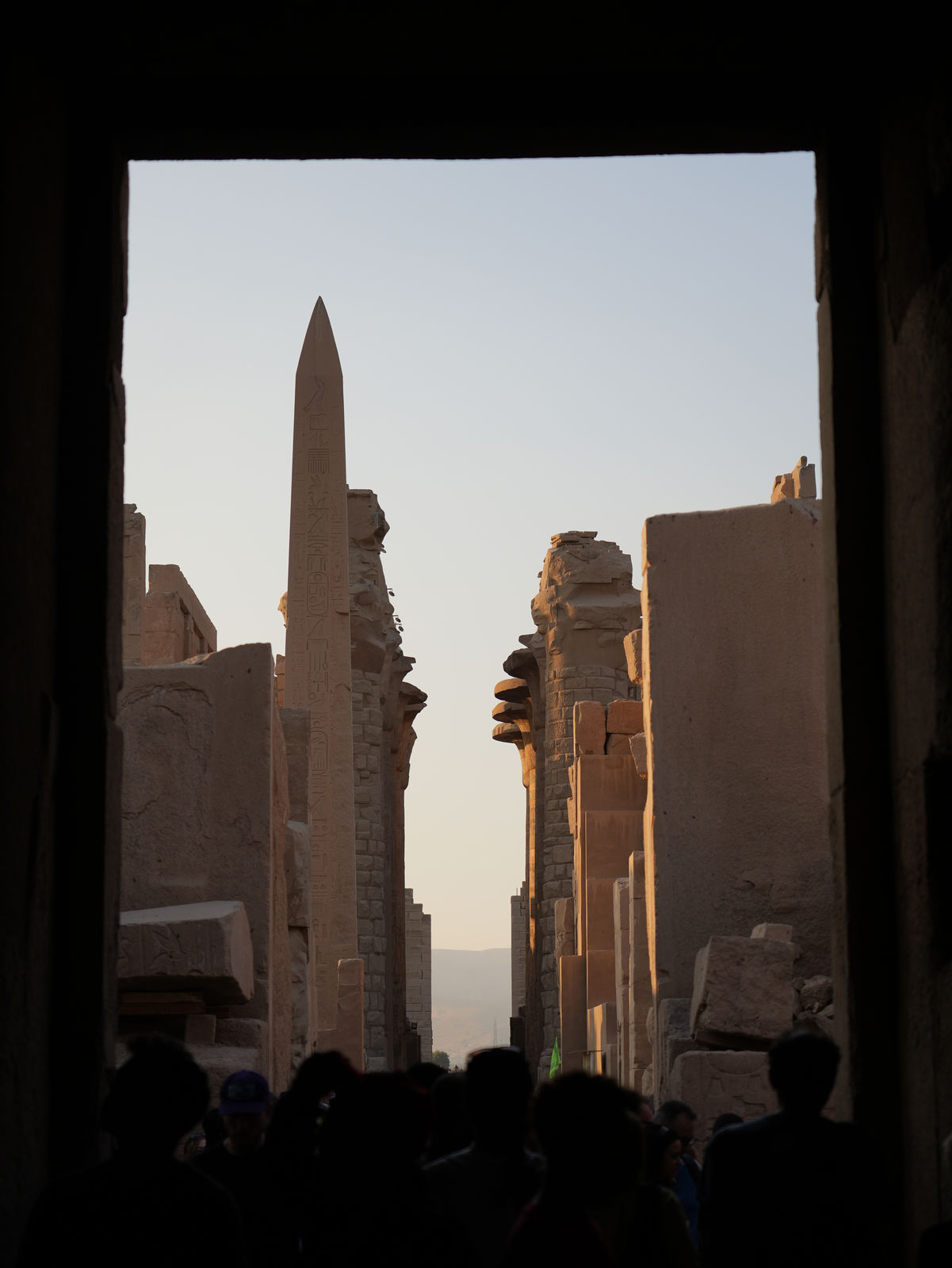 The Obelisk of Hatshepsut framed by a monumental doorway at Karnak Temple