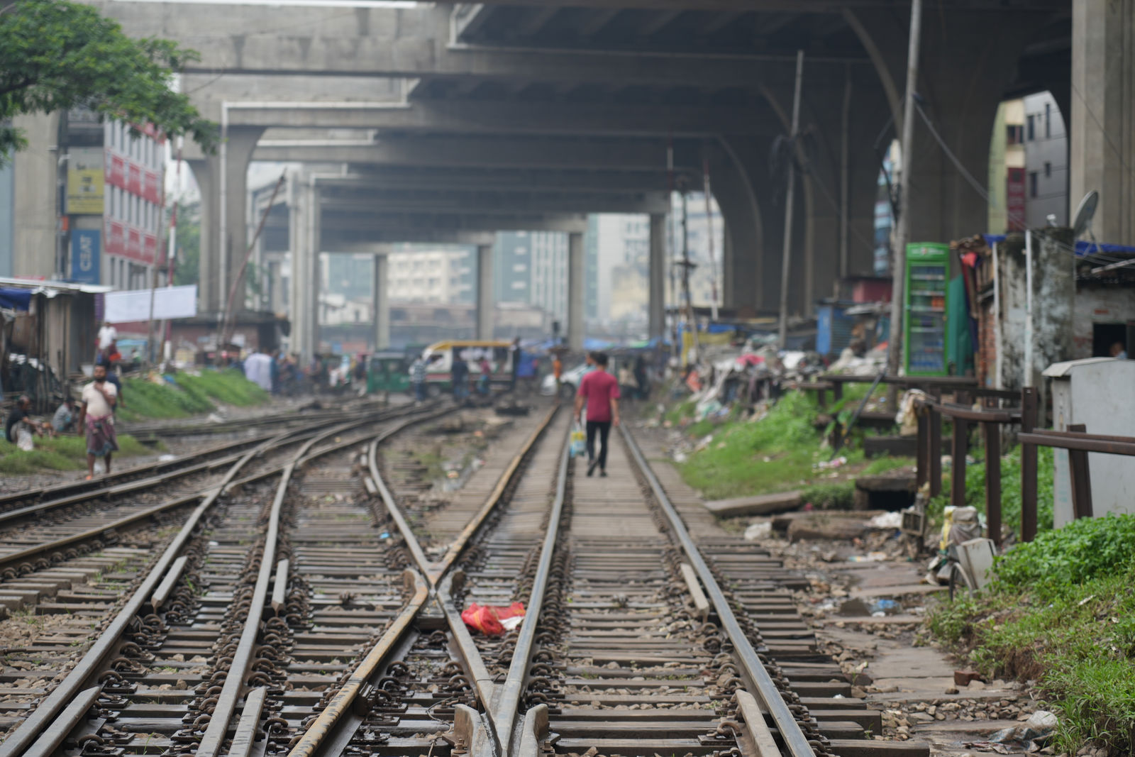 Railway tracks running under a flyover