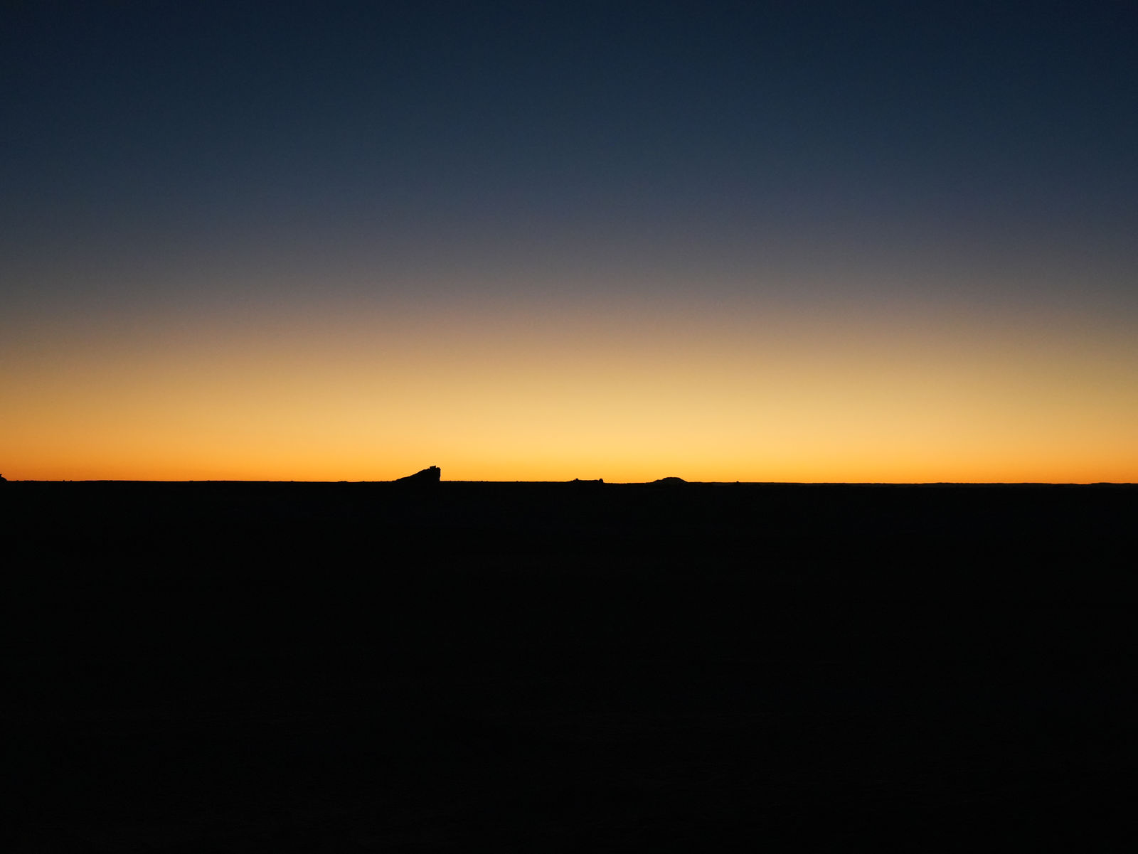 A perfect twilight gradient over the silent Giza Desert