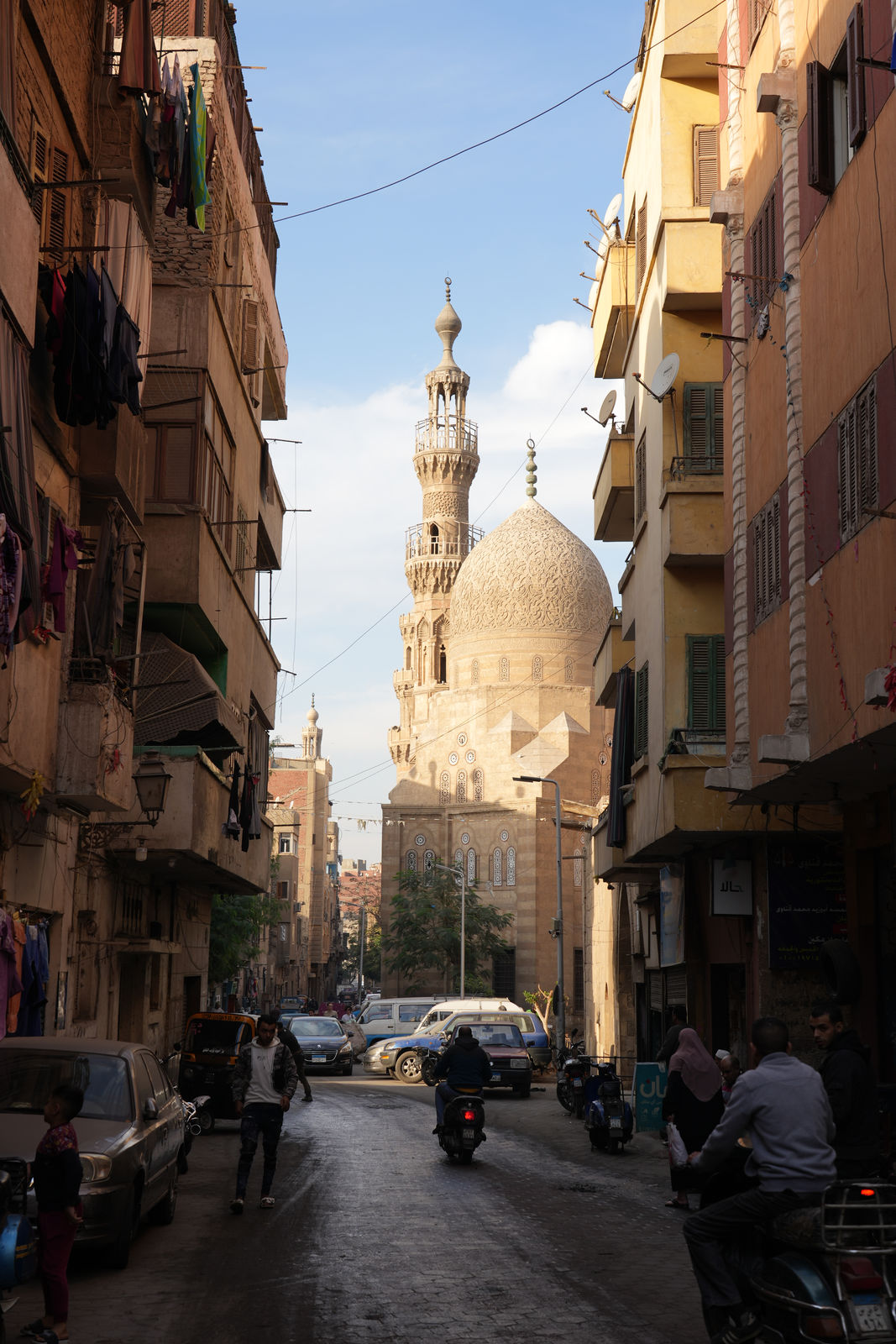 The stunning carved dome of the Amir Khayrbak Complex framing the street view