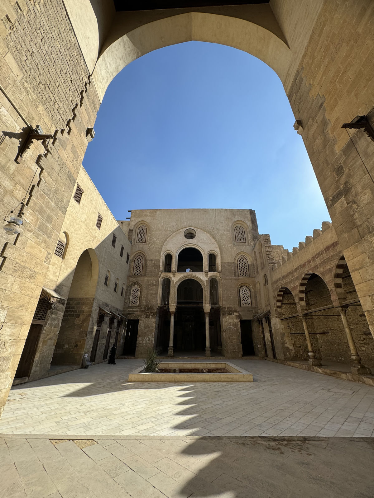 The grand stone arch framing the courtyard of the Complex of Qalawun