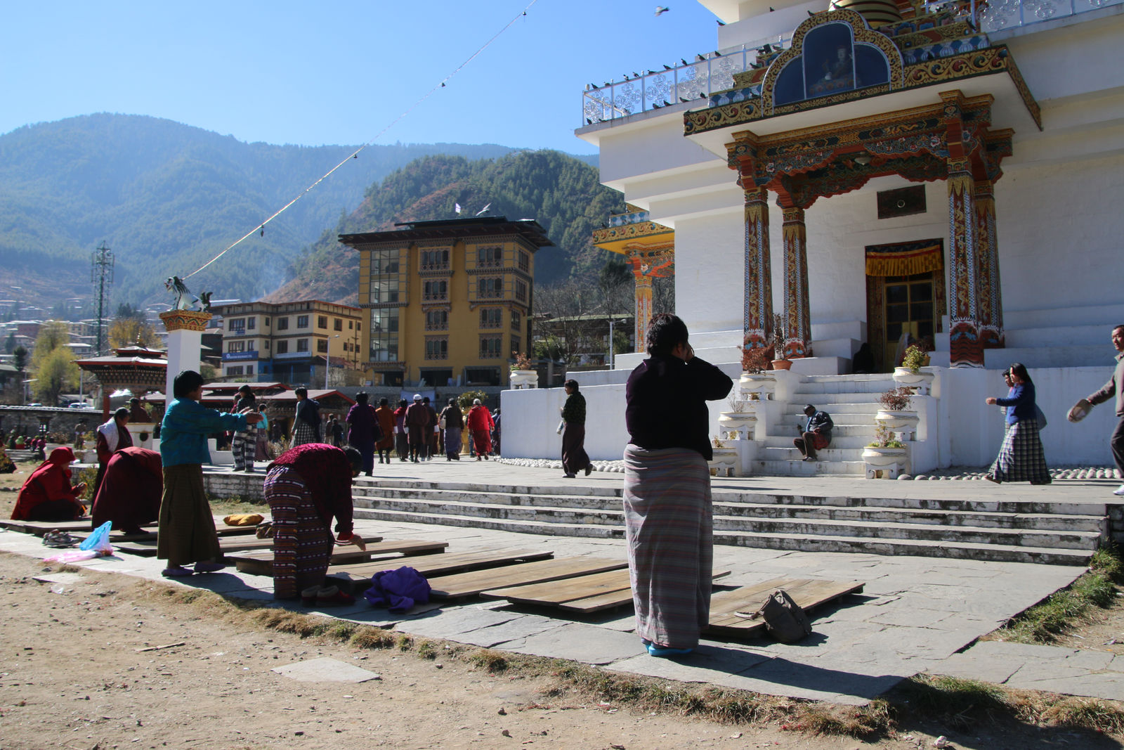 Devotees praying at the Memorial Chorten