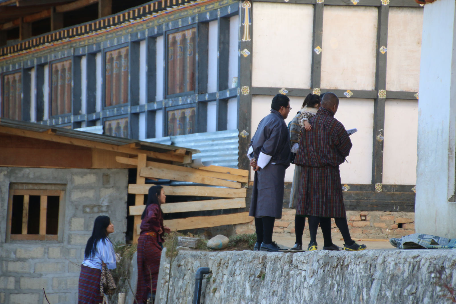 Local people wearing traditional Bhutanese dress (Gho and Kira)