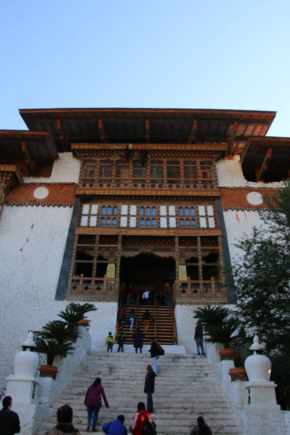 The steep stone staircase leading into the historic Punakha Dzong