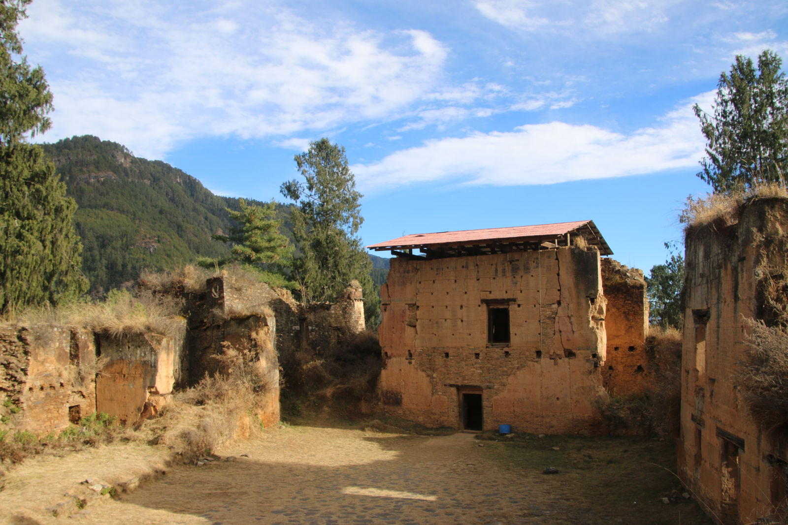The crumbling stone walls of the historic Drukgyel Dzong ruins