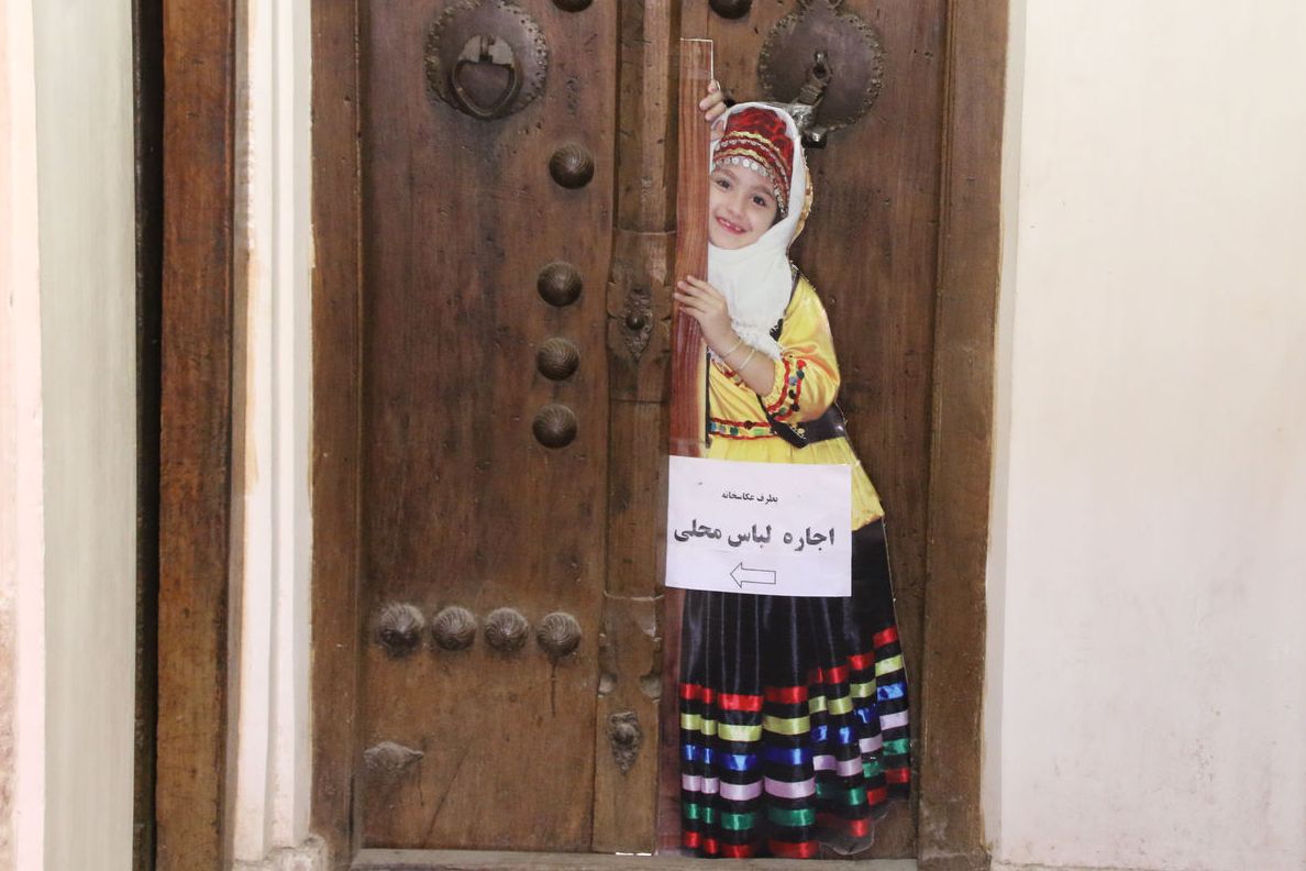 Traditional costume rental sign in Iran